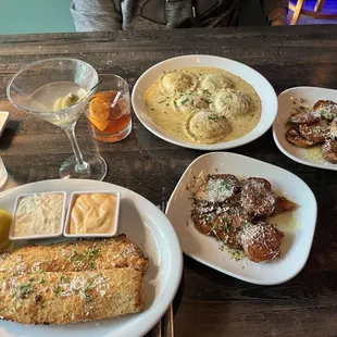 Panko Walleye, two dipping sauces along with Lobster Ravioli in a lovely dill cream and of course Broadway Potatoes.
