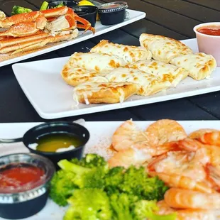 Crab, cheesy bread, steamed shrimp.