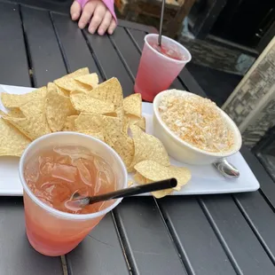 Crab dip. Henny punch in front and something fruit with rum in the back.