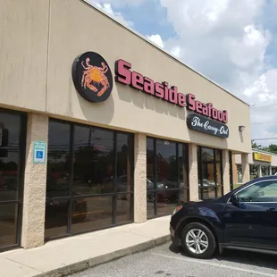 a car parked in front of the store