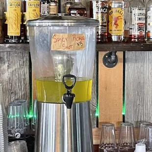 a beverage dispenser on a bar