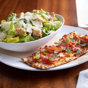 Wood-Grilled Filet Mignon served with asparagus, Yukon mash, red wine and mushroom sauce.
