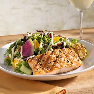 Wood-Grilled Filet Mignon served with asparagus, Yukon mash, red wine and mushroom sauce.