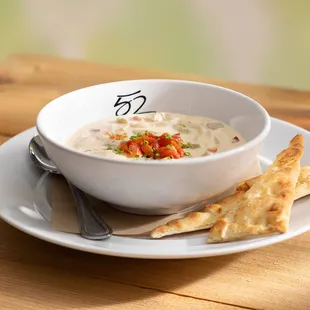 Wood-Grilled Filet Mignon served with asparagus, Yukon mash, red wine and mushroom sauce.