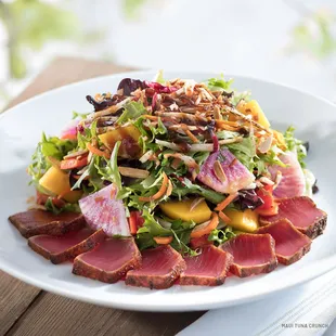 Wood-Grilled Filet Mignon served with asparagus, Yukon mash, red wine and mushroom sauce.