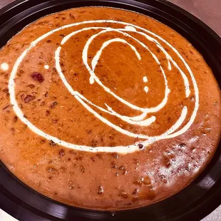 Dal Makhni 
Lentils cooked in tomatoes, spices and cream