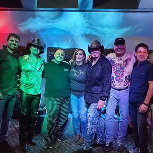 a group of people posing for a picture