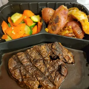 Filet mignon in bordalaise sauce. With roasted red potatoes and veggies.