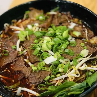 18. Chef's Special Spicy Beef Noodle $19 (Level 2)
