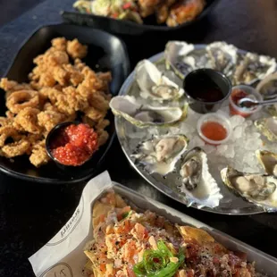 Crispy Calamari, Garlic Wings, poke nachos &amp; oysters during Happy Hour 09.02.24