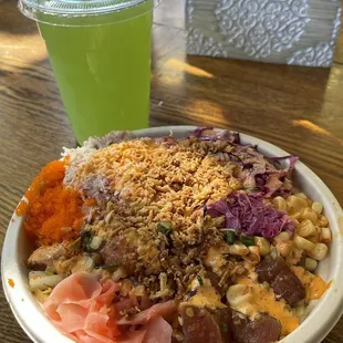 Shoyu Ahi Poke Bowl with kimchee corn, lemon pepper crab salad, slaw, masago, pickled ginger, fried onion and spicy mayo!