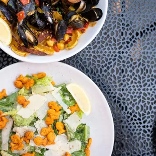 Caesar salad and steamed mussels at Seatown in Pike Place near Downtown Seattle