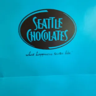 a blue bag with a chocolate logo