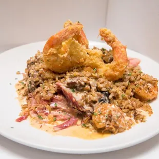 a plate of fried shrimp and rice