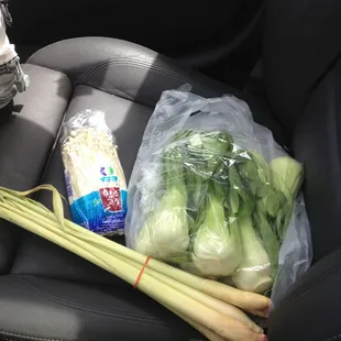 Enoki mushrooms, 3 pounds of baby bok choy, bunch of lemongrass=$5.65