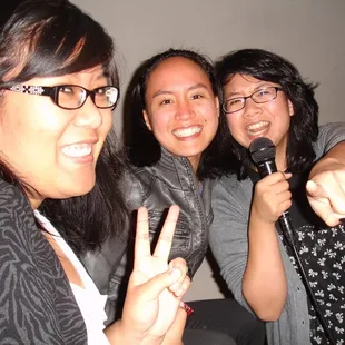 three women posing for a picture