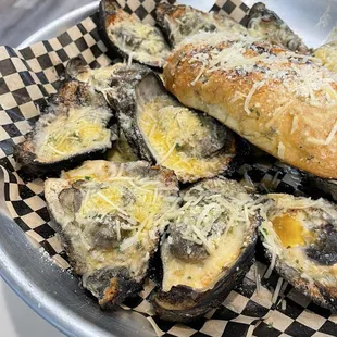 A dozen of char grilled oysters