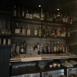  bar with a lot of bottles on the shelves