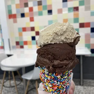 an ice cream cone with sprinkles