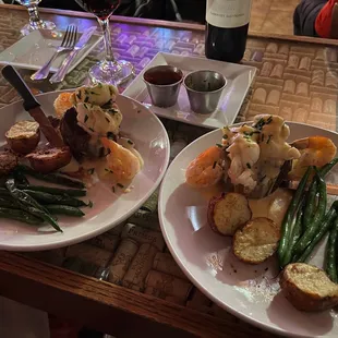 Filet mignon topped with lobster and shrimp, roasted potatoes and green beans.