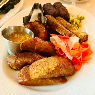 Vegan Harvest of the Caribbean: Impossible Kabob, Fried Jerk Tofu, Plant-Based Sausage, Caribbean Fish Cake