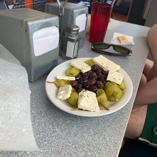 "A little Greek pre-lunch treat and Alex can't be beat." Oh yeah....!