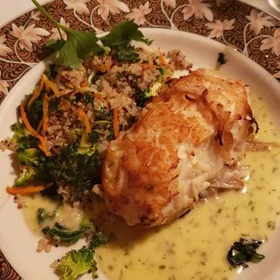 Potato crusted halibut!  Fish cooked perfectly. Quinoa on the side however was rather boring.