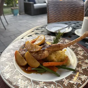 Pork chops special with mashed potatoes and roasted vegetables