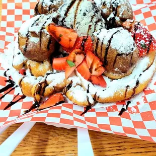 strawberries and chocolate covered donuts