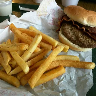 Homemade burger with bacon and fries