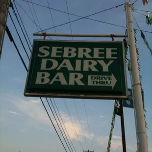 a sign for sebree dairy bar