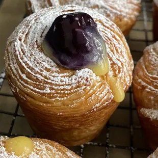 a pastry with a blueberry on top