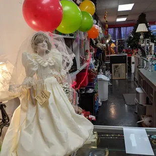 Princess Di doll on the cashier counter