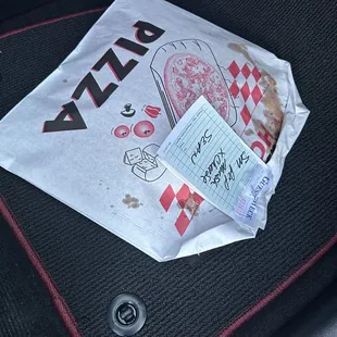 No pizza box?? It's on card board in a paper envelope. Already touching the pizza