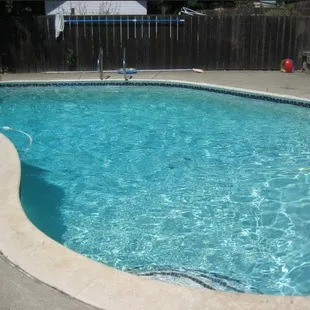 a pool in a backyard