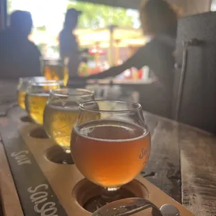 a row of glasses of beer