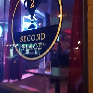 a sign in a window of a restaurant