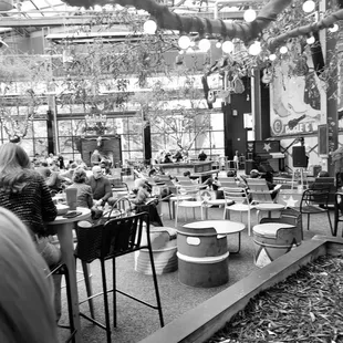 a black and white photo of a restaurant