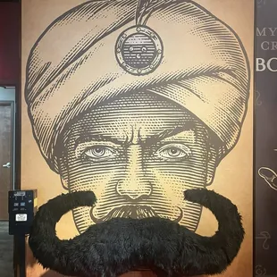 Wall decor with moving mustache