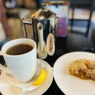 a plate of cookies and a cup of coffee