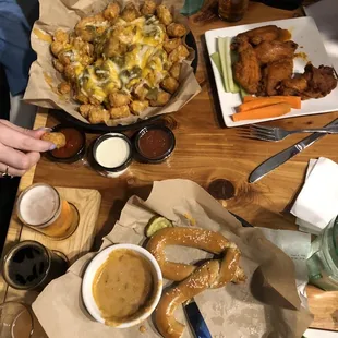Tater tots, pretzel, and wings