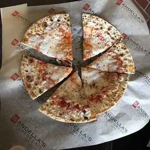 a sliced pizza on a table