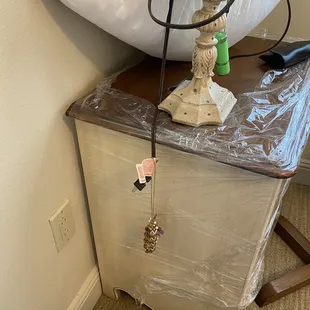 Expensive jewelry hanging off a lamp cord. And the lamp was broken.