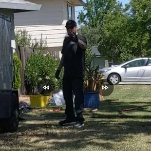 Employee calling me a terrorist. He blocked me from leaving until other employees were involved and tried to loom over me and threaten me.