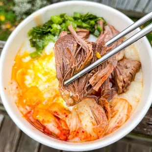 Slow-Cooked Beef and Kimchee Congee | IG: @SnaccyChan