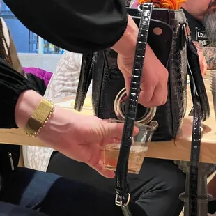 Wine served from purse