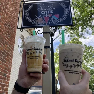 Brown sugar milk tea and regular black milk tea with boba.