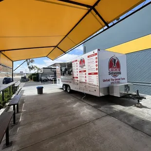 a food truck parked in a parking lot