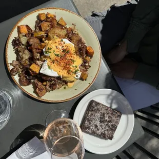 Carnitas hash, walnut brownie, rose
