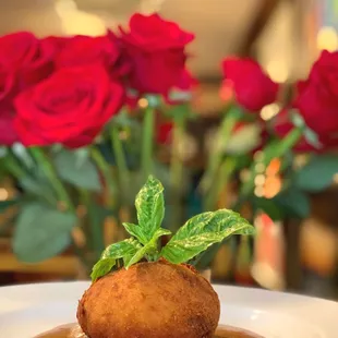 a plate of food and flowers